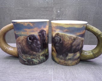 2605 Pair of Wild Wings Dusty Plains Bison 16 oz Sculpted Coffee Mugs by Rosemary Millette