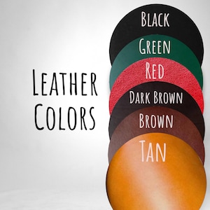 May include: A visual guide showcasing leather colors. The image displays a series of overlapping, semi-circular swatches in various shades, including black, green, red, dark brown, brown, and tan. The text "LEATHER COLORS" is written in black, sans-serif font.