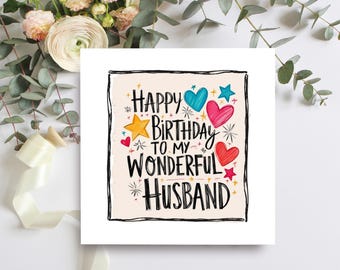 May include: A card with a pink, white and yellow background featuring the text "Happy Birthday to my Wonderful Husband" in black lettering. The card is decorated with colourful hearts, stars and confetti.