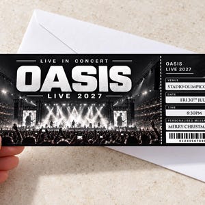 May include: A black and white concert ticket for Oasis Live 2027 at Stadio Olimpico Rome on Friday 30th July at 8:30 PM. The ticket features a crowd at a stadium concert and includes a personalised message reading Merry Christmas Billy.