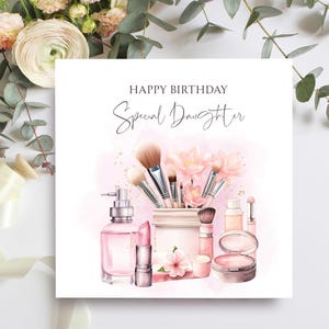 Biglietto di auguri di compleanno per figlia, design con trucco e fiori, compleanno speciale per figlia, grazioso biglietto rosa per ragazza adolescente o figlia adulta