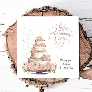 Superbe carte de mariage avec un gâteau de mariage floral et un message sincère, une belle carte pour les mariés lors de leur journée spéciale