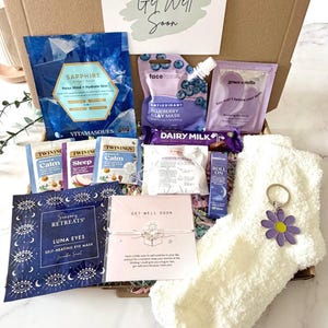 our A4 gift box option includes cosy socks, flower keyring, self heating eye mask, Cadbury chocolate bar, get well soon bracelet, lavender roll on , face sheet mask, under eye mask, blueberry Clay face mask, herbal tea bags, bath bombs and tea light candles. ready to send direct to the recipient