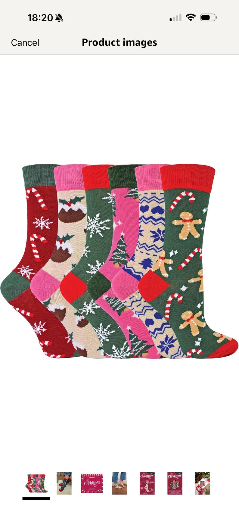 May include: A set of six crew socks featuring various holiday patterns including candy canes, snowflakes, Christmas puddings, pine trees, gingerbread men, and geometric shapes in red, green, pink, beige, and blue color palettes.