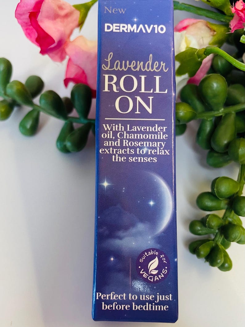May include: A blue box of DERMAV10 Lavender Roll On, with text that reads "With Lavender oil, Chamomile and Rosemary extracts to relax the senses." The box is suitable for vegans and perfect to use before bedtime.