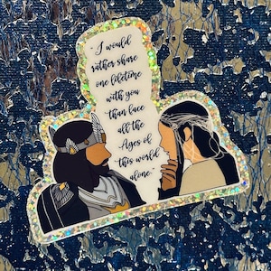 May include: A glittery sticker with a quote from the Lord of the Rings: "I would rather share one lifetime with you than face all the Ages of this world alone."