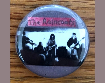 The Raincoats 1.25" pinback button, post-punk, punk rock pin