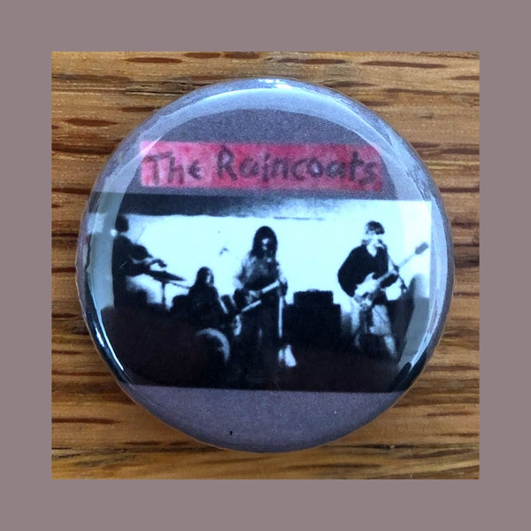 The Raincoats 1.25" pinback button, post-punk, punk rock pin