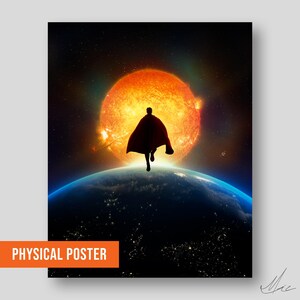 May include: A physical poster featuring a silhouette of a figure with a cape, running towards a bright orange sun. The figure is positioned above a blue and green planet, with a starry background. The words "PHYSICAL POSTER" are in an orange rectangle.