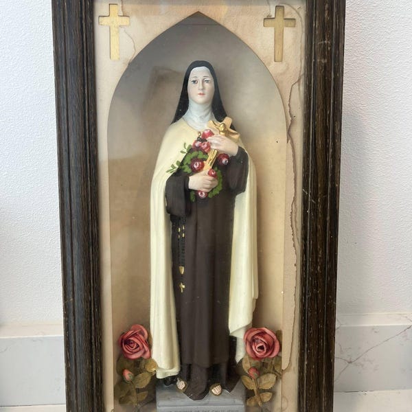 Vintage shadow box with Statue of St Therese 21 1/4” long, 11 1/4” wide and 3.5” deep