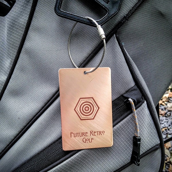 Custom design metal golf bag tag - Copper or Brass with optional Titanium bolt. Laser engraved personalisation. Wedding luggage label.