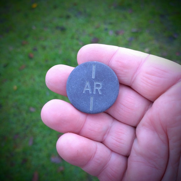 Slate custom golf ball marker with laser engraved personalisation or any design. Pocket stone, EDC coin, wedding anniversary, game piece.