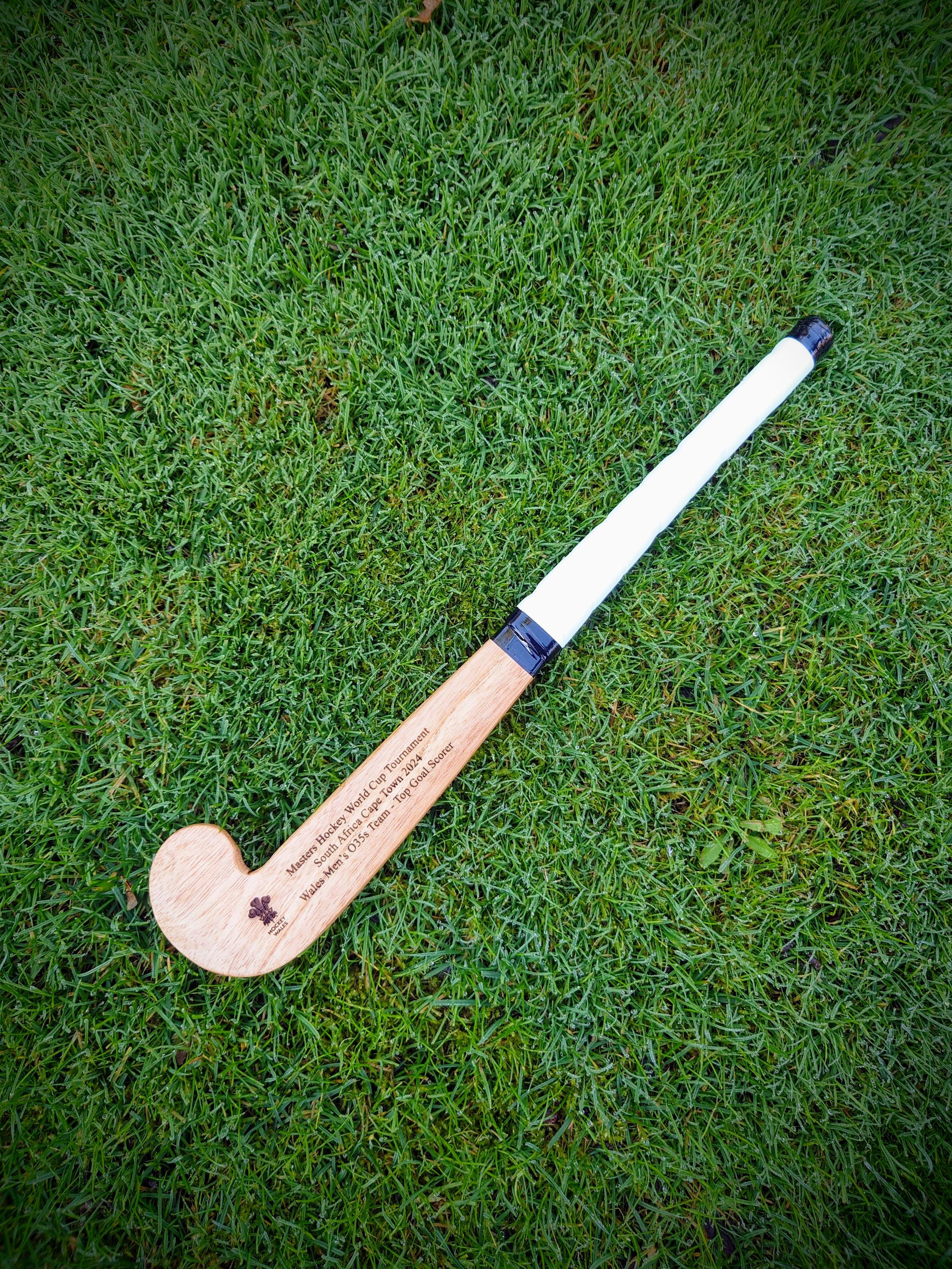 Hockey stick with engraved personalisation. Sporting club gift. Retirement memento. Top scorer trophy. Corporate prize award. Teacher thanks