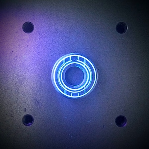 Tron identity disc - Steel golf ball marker - UV glow paint. Game token. Clubbing jewellery necklace pendant. Geek gift. Cyberpunk. Cosplay.