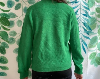 1960er Jahre Izod Lacoste Damen Pullover mit V-Ausschnitt. Erstaunlich