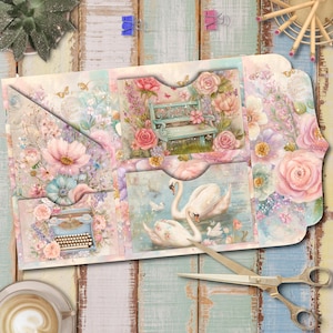 May include: A decorative paper folder featuring a pastel floral design with illustrations of a light blue bench, a vintage typewriter, and two white swans on water. The folder has multiple pockets and is decorated with pink roses and butterflies.