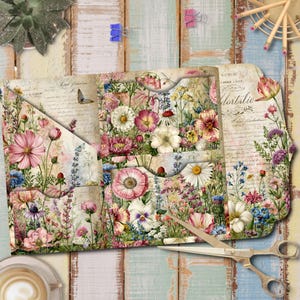 Peut inclure: Un portfolio en papier plié orné d'un imprimé floral de style vintage avec diverses fleurs sauvages, des papillons et du texte en écriture cursive. Le design comprend plusieurs poches et sections superposées aux tons roses, blancs et bleus.