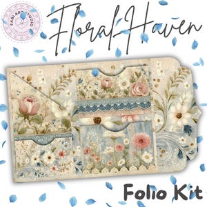 May include: A paper folio kit titled Floral Haven featuring a cream-coloured background with printed illustrations of pink roses, white daisies, and blue floral accents. The kit includes multiple pockets with scalloped edges and intricate lace-like patterns.