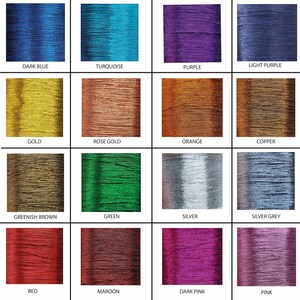 May include: A colour chart of 16 different embroidery floss colours, including dark blue, turquoise, purple, light purple, gold, rose gold, orange, copper, greenish brown, green, silver, silver grey, red, maroon, dark pink, and pink.