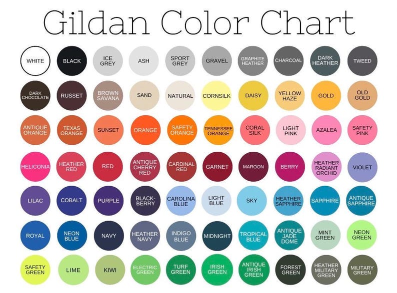 May include: Gildan Color Chart showing a variety of colors in a grid format. The colors are arranged in rows and columns, with each color represented by a circle. The colors include white, black, ice grey, ash, sport grey, gravel, graphite heather, charcoal, dark heather, tweed, dark chocolate, russet, brown savana, sand, natural, cornsilk, daisy, yellow haze, gold, old gold, antique orange, texas orange, sunset, orange, safety orange, tennessee orange, coral silk, light pink, azalea, safety pink, heliconia, heather red, red, antique cherry red, cardinal red, garnet, maroon, berry, heather radiant orchid, violet, lilac, cobalt, purple, black-berry, carolina blue, light blue, sky, heather sapphire, sapphire, antique sapphire, royal, neon blue, navy, heather navy, indigo blue, midnight, tropical blue, antique jade dome, mint green, neon green, safety green, lime, kiwi, electric green, turf green, irish green, antique irish green, forest green, heather military green, military green.