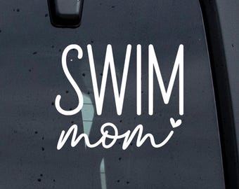 May include: White vinyl decal with the text "Swim Mom" and a small heart.