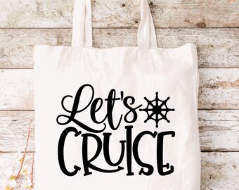 May include: A white canvas tote bag with two top handles, featuring black printed text that reads Let's CRUISE, accompanied by a black graphic of a ship's steering wheel positioned to the right of the word Let's.