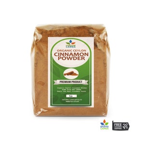 May include: A brown bag of organic Ceylon cinnamon powder. The bag has a green label with the words "Organic Ceylon Cinnamon Powder" and "Premium Product". The label also includes the text "1 lb" and "Natural Lanka Pvt Ltd, Product of Ceylon".