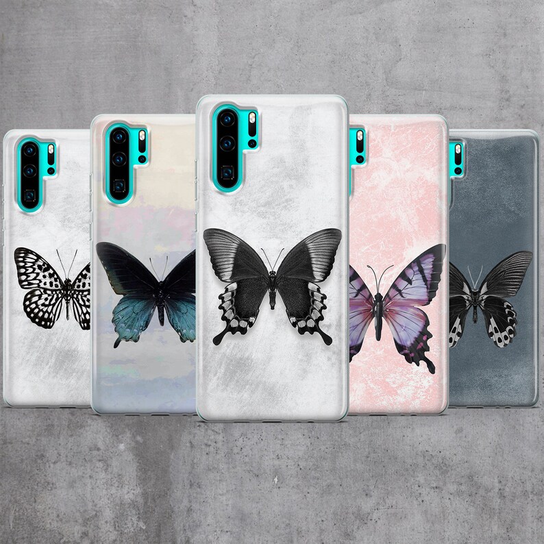 May include: Five different phone cases with butterfly designs. The cases are clear and show a variety of butterfly designs on a white, pink, blue, and gray background.