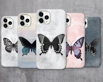 May include: Five different phone cases with butterfly designs. The cases are all white with a different butterfly design on each. The butterflies are all black and white, with the exception of one which is purple and white.