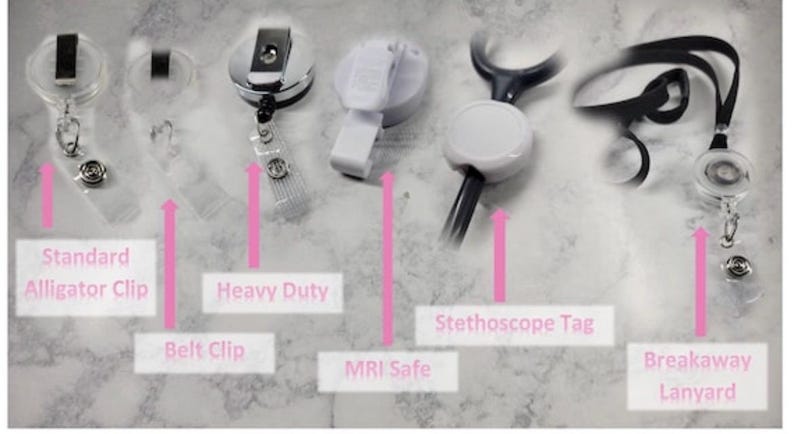 May include: An assortment of badge reels and accessories, including a standard alligator clip, belt clip, heavy-duty reel, MRI safe clip, stethoscope tag, and breakaway lanyard. The image displays the different styles and features of each item.