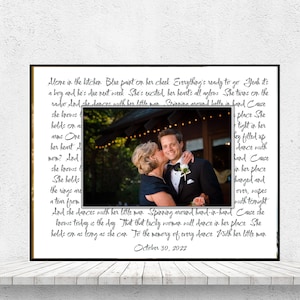 May include: A framed photograph featuring a couple, with a woman kissing a man on the cheek. The photo is surrounded by handwritten text in black ink. The date "October 30, 2022" is visible at the bottom.