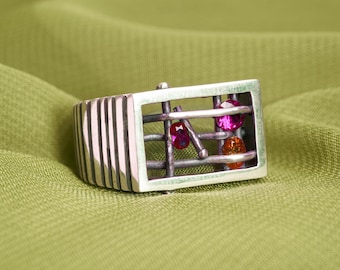 Hollow - Handmade, Unique, Sustainable Sterling Silver Signet Ring with Rubies