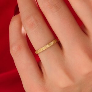 14k solid yellow gold 2mm flat top comfort fit eternity sun engraved wedding band ring on hand