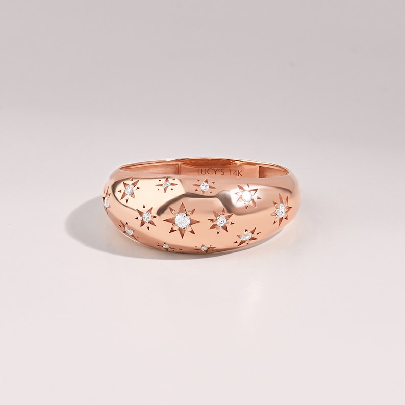 14k Solid rose Gold scattered stars Dome statement Ring with tiny round G Colour SI Clarity genuine diamonds on a white background