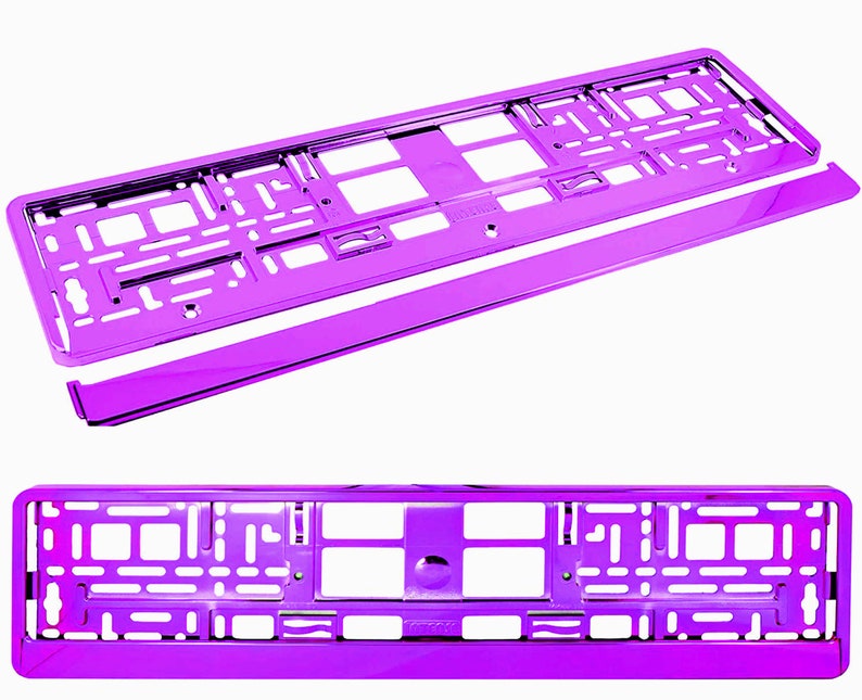 May include: A pair of shiny, purple license plate frames. The frames are rectangular with a series of cut-out shapes and a separate, matching purple bar. The frames are designed to hold a standard license plate.