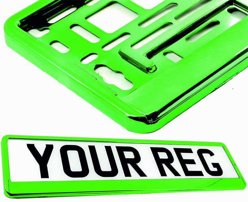 May include: Bright green license plate frame and plate. The plate has the text "YOUR REG" in bold black letters on a white background. The frame is a shiny, reflective green.