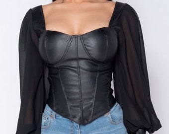 Leather bodice with semiring.