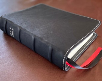 Black cowhide leather Giant Print Bible with silver perimeter stitching and two ribbons