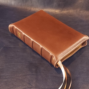 Brown Nappa sheepskin leather Life Application Study Bible, Large Print with light tan perimeter stitching and three ribbons