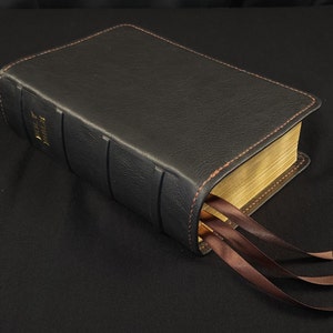 Black cowhide leather Super Giant Print Reference Bible with brown perimeter stitch and three chocolate brown ribbons