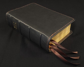 Black cowhide leather ESV Study Bible with brown perimeter stitch and three chocolate brown ribbons