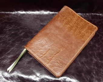 Brown sheepskin leather ESV Study Bible with tan stitching and two ribbons