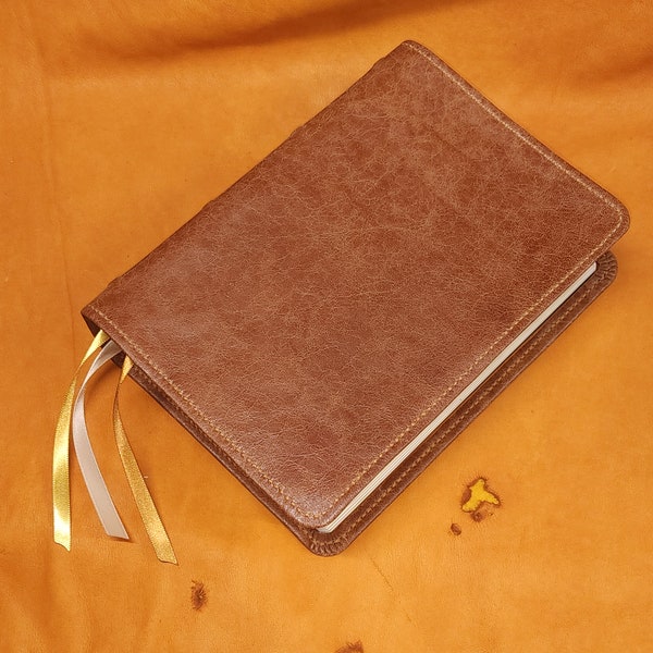 Brown sheepskin leather ESV Study Bible with honey brown perimeter stitching and three ribbons