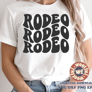 May include: A white t-shirt with the word "RODEO" repeated three times in a black, retro font.