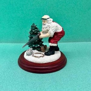 Vintage Santa Figurine Sawing A Christmas Tree with Bunny - Rare Find
