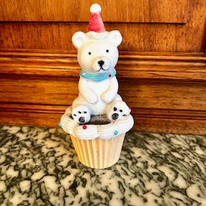Adorable Teddy Bear On A Birthday Cupcake