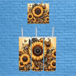 May include: Three 20 oz stainless steel tumblers with a sunflower and leopard print design. The tumblers have lids and straws.