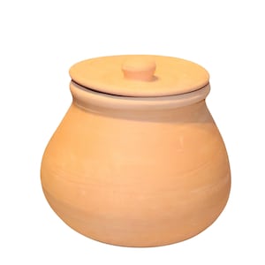 May include: A terracotta ceramic jar with a matching lid. The jar has a rounded body and a slightly flared rim. The lid has a small knob for easy removal. The jar is likely used for storage or decorative purposes.