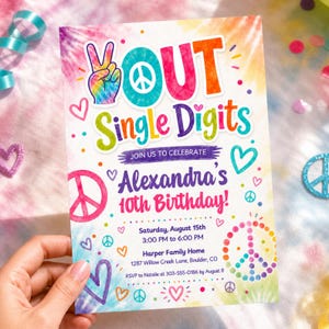 May include: A rectangular birthday invitation card with a tie-dye background featuring the text OUT Single Digits, JOIN US TO CELEBRATE, Alexandra's 10th Birthday!, Saturday, August 15th, 3:00 PM to 6:00 PM, Harper Family Home, 1287 Willow Creek Lane, Boulder, CO.