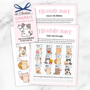 May include: A pink and white treasure hunt game set with a bookmark and two game sheets. The bookmark reads "For Charlotte, Congrats, Treasure Hunter" with a cartoon cat. The game sheets feature cat illustrations and puzzles.